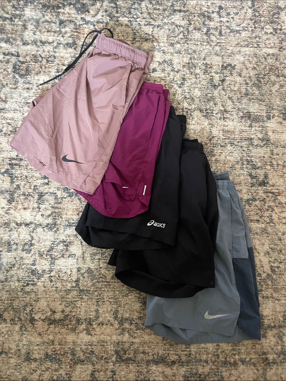 5 pair of Men's Athletic Shorts Nike and ASICS- Sizes medium and large